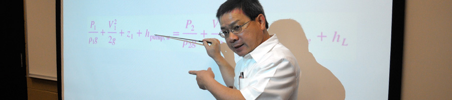 Dr. Van teaches a class.