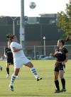 Bridget Roney jumps to attempt to control the possession of the ball. - Photo by Tommy Sadler