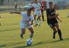 Bridget Roney races a Freed-Hardeman player for the ball in Union 1-0 win. - Photo by Tommy Sadler