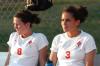 Roxanna Skelton (8) and Julie Ocampos-Barry (3) rest during halftime of Union's win over Freed-Hardeman. - Photo by Tommy Sadler