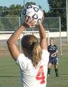 Emily Rawls looks for a teammate prior to a throw-in during Union's 2-0 win over Lambuth. - Photo by Tommy Sadler