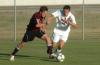 Union's Chris Waugh (25) works against a Cumberland player to control possession of the ball. - Photo by Steven Aldridge