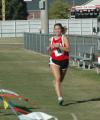 Hannah Clardy crosses the finish line during the Union University Cross Country Invitational.  - Photo by Tommy Sadler