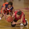 Langston's #42 Patrice Sims and Unions #11 Jennifer Henson fight for the ball in the first round of the NAIA championship. Stephan Frazier/The Jackson Sun - Photo by Stephan Frazier