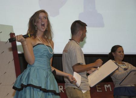 Sophomore Bonnie Smith reacts to a contestant's response at the SAC Game Show during Focus.