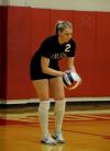 Lady Bulldog CJ Neathamer prepares to serve in a match versus Rhodes (Tenn.) College. - Photo by Morris Abernathy