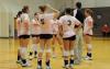 Coach Greams talks with his players during a timeout. - Photo by Morris Abernathy