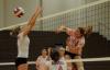 Anna Sims goes for a kill in a match versus Rhodes (Tenn.) College. - Photo by Morris Abernathy