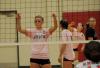 Ashley Young (5) awaits the serve from her teammate, Lindsey Wallach (7) - Photo by Morris Abernathy