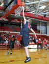 Freshman Luke Allison makes a layup during warm ups before Bulldog Madness. - Photo by Morris Abernathy
