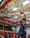 Junior guard Antoine Joseph goes up for a dunk during warm ups at Bulldog Madness. - Photo by Morris Abernathy