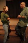 Senior psychology major Amanda Hamilton talks with Russ Pflasterer after he spoke in chapel concerning Christ-like use of economics.  - Photo by Beth Spain
