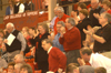 President David S. Dockery and other Bulldog fans cheer for the men's basketball team during the Hannabal-LaGrange Homecoming game. - Photo by Lindsay Stavish