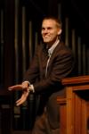 David Platt encourages students to be a stronger community of faith that depends on Christ during a recent chapel service.  Here he parallels the experience of birthing his son to Peyton Manning. - Photo by Beth Spain