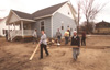 The GO Battle Creek team cleans up a Habitat for Humanity work site. - Photo by Justin Veneman