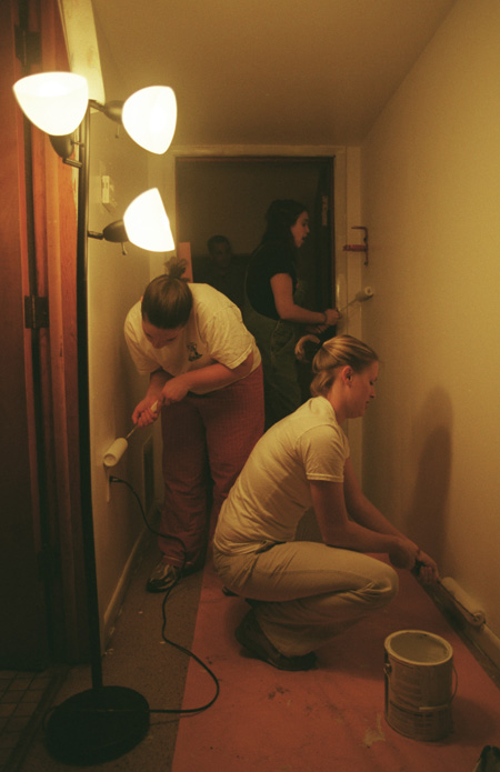 Union's Nikki Vassar (left), Heather Moellman (right) and Bekah Traynor (center, background) paint the education facility at University Baptist Church during GO Illinois.