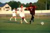 Dejan Kostic (23) fights for the ball against a Cumberland player during a Family Weekend game. - Photo by Kristi McMurry