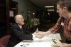Leland Leryla greets Jeremy Black after the Carls-Schwerdfeger Lecture. - Photo by Beth Spain