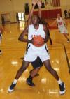 Josephine Owino gets position in the lane for a shot. - Photo by Morris Abernathy