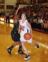 Lyndsay Flynn drives past a defender as she moves toward the basket. - Photo by Morris Abernathy