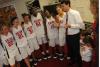 Mark Campbell, head coach, talks to his players during their post-game meeting. - Photo by Morris Abernathy