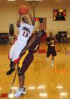 Martez Hawkins, junior, shoots over a defender from Robert Morris (Ill.) College in Union's Homecoming win. - Photo by Morris Abernathy