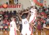 Antoine Joseph (22) blocks a shot by Robert Morris (Ill.) College in Union's Homecoming victory. - Photo by Morris Abernathy