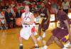 Senior guard Matt Neaville prepares to take a shot over a defender in Union's Homecoming victory over Robert Morris (Ill.) College. - Photo by Morris Abernathy