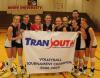 The Union volleyball team gathers around their TranSouth Conference Tournament Championship banner. - Photo by Morris Abernathy