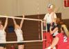 Anna Sims hits the ball over net in a match versus Lyon College in the TranSouth Conference Tournament. - Photo by Morris Abernathy