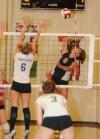 Heather Lieberman attacks the ball over Trevecca blockers during the championship match of the TranSouth Conference Tournament. - Photo by Morris Abernathy