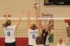 Amanda Hutchison Coyle goes up for a hit over two Trevecca blockers during the championship match of the TranSouth Conference Tournament. - Photo by Morris Abernathy