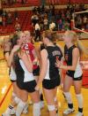 The Union volleyball players celebrate following the final point, earning them the conference tournament title. - Photo by Morris Abernathy
