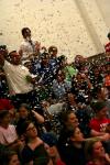 Students cheer and toss confetti during Bulldog Madness. - Photo by Kristi McMurry