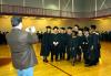 December graduates pose for a group photo before the commencement service begins.  - Photo by Kristi McMurry