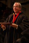 President Dockery presents a diploma to a graduate at the fall commencement service on December 19, 2008. - Photo by Angela Abbamonte