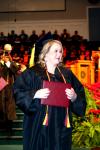 Autumn Brooke Lewis, receiving her bachelor of science in organizational leadership, happily displays her diploma at the fall graduation ceremony. - Photo by Kristi McMurry