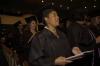 Donna Waddell sings the Alma Mater at the end of the fall graduation ceremony. - Photo by Beth Spain