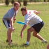 Assignment: Ultimate Frisbee Intramurals - Freshmen Daniel Holsinger, biology major, and Jason Nolan, Christian studies major, wonder which team will catch the frisbee once it's out of their hands. - Photo by Kristen Hiller