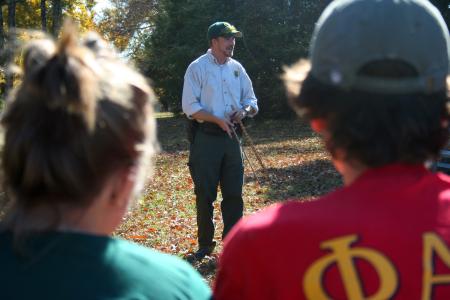 Pinson Mounds Park Ranger Wesley Williams talks about atlatl spear-throwing during an afternoon learning session.  History students and faculty were able to try this ancient technique. 