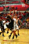 Kayla Hudson, sophomore guard, goes up to block a shot during the Lady Bulldog's win over Azusa Pacific (Calif.) University during the Jackson Rotary Classic.  - Photo by Kristi McMurry