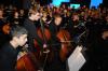 The 250-voice community choir and 30-piece orchestra warm up before <em>Remembering Feb. 5: An Evening of Thanksgiving</em>. - Photo by Morris Abernathy