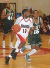 Junior guard Martez Hawkins (13) brings the ball down the floor in Union's 122-80 win over Life (Ga.) University. - Photo by Morris Abernathy
