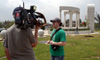 Jeremy Scott, a senior from Memphis, TN speaks with Nashville's News Channel 5, WTVF.  He and other Union students helped with clean up at Unity Park, a memorial to the victims of Jackson's 1999 tornado. - Photo by Jim Veneman