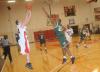 Senior guard Matt Neaville makes a three pointer over a defender in the Bulldog's win over Life (Ga.) University. - Photo by Morris Abernathy