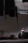 Union theatre professor David Burke assesses the damage incurred to the roof of the Carl Perkins Civic Center, site of the upcoming 2003 Scholarship Banquet with Benjamin Netanyahu. - Photo by Jim Veneman