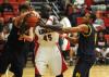 Sophomore center Roland Banhoro (45) grabs a rebound in Union's win over Blue Mountain (Miss.) College. - Photo by Morris Abernathy