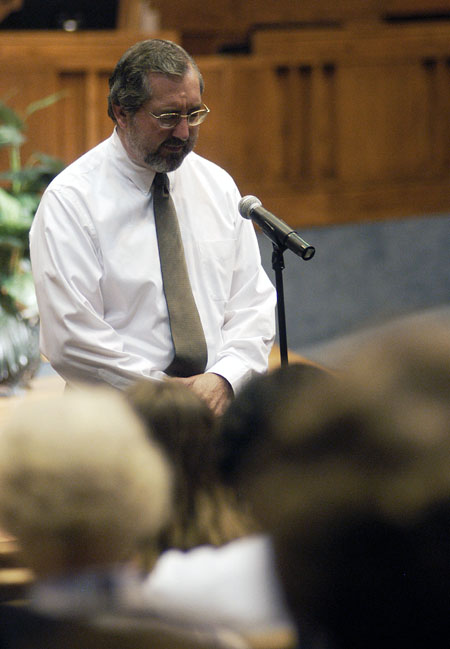 Union professor Sam Myatt offers up a prayer at the citywide prayer service that was held at First Baptist Church, Jackson.
