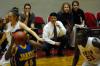 Coach Campbell encourages his players from the bench with little time to go in the first half of the first game in the NAIA tournament on Wednesday.  - Photo by Beth Spain