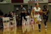 Sophomore Laura Crittendon drives the ball down the court during the last half of the first game of the NAIA Tournament on Wednesday.  - Photo by Beth Spain